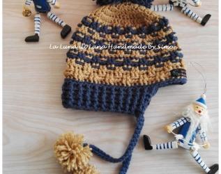 Cappellino per bambino o bambina ad uncinetto con pom pom e paraorecchi