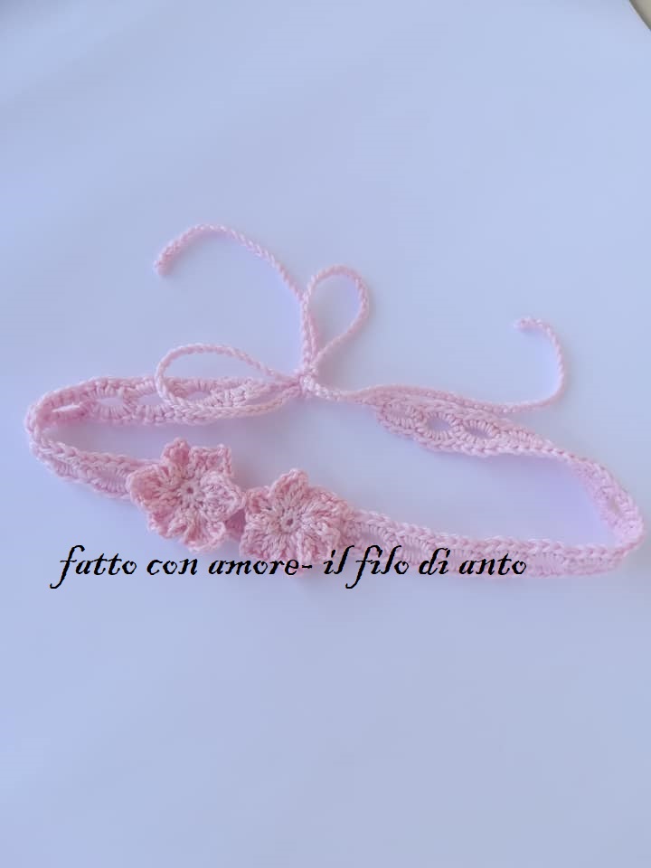 Fascia bambina rosa con fiore