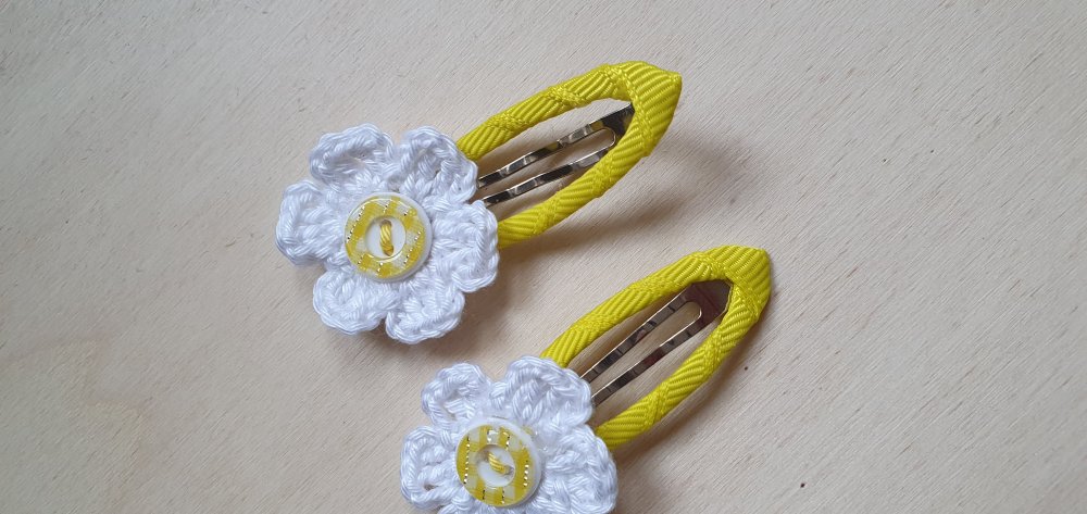 Coppia fermagli con fiore