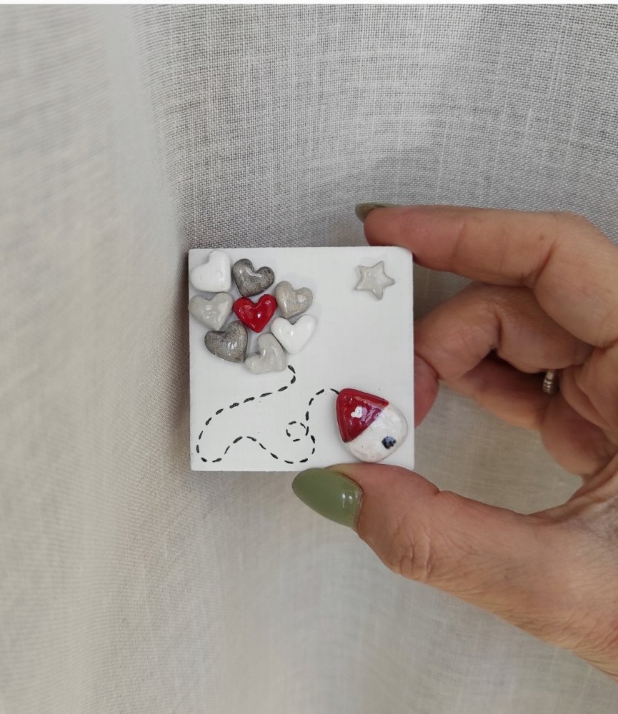 Magnete con casetta volante
