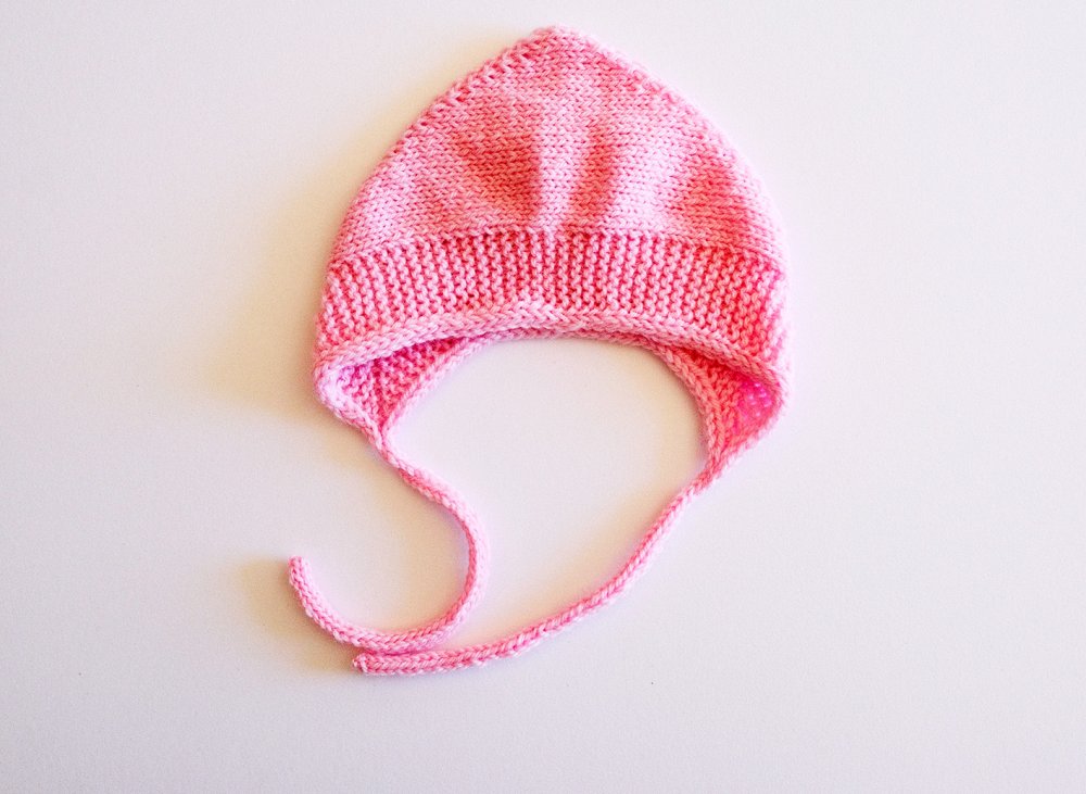 Cuffia per bambine fatta ai ferri in pura lana merino