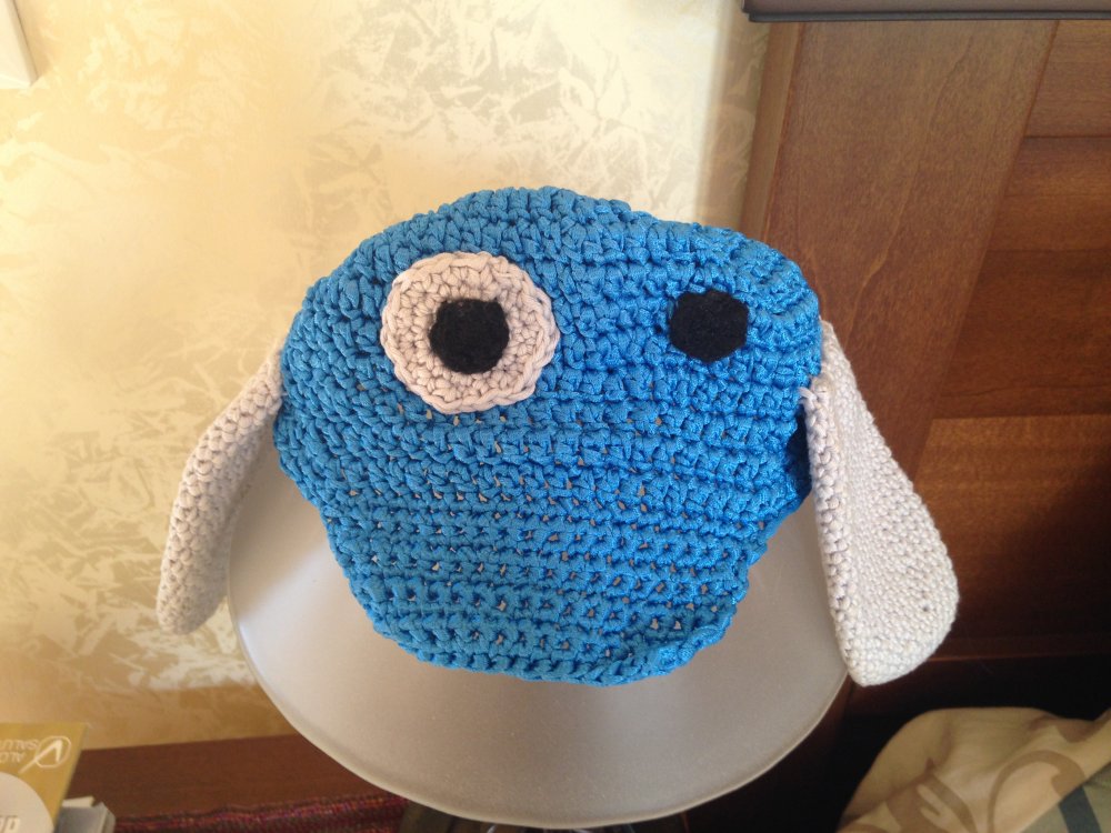 Cappello con visiera e paraorecchie cane 
