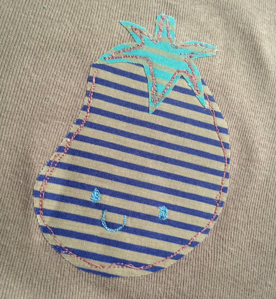 Baby body con applique di una melanzana felice