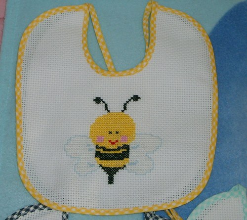 Bavaglino con ape allegra e sorridente