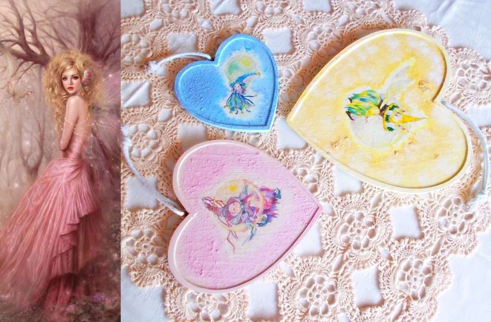 Tris di cuori in legno decorati a decoupage per arredare un angolo di parete