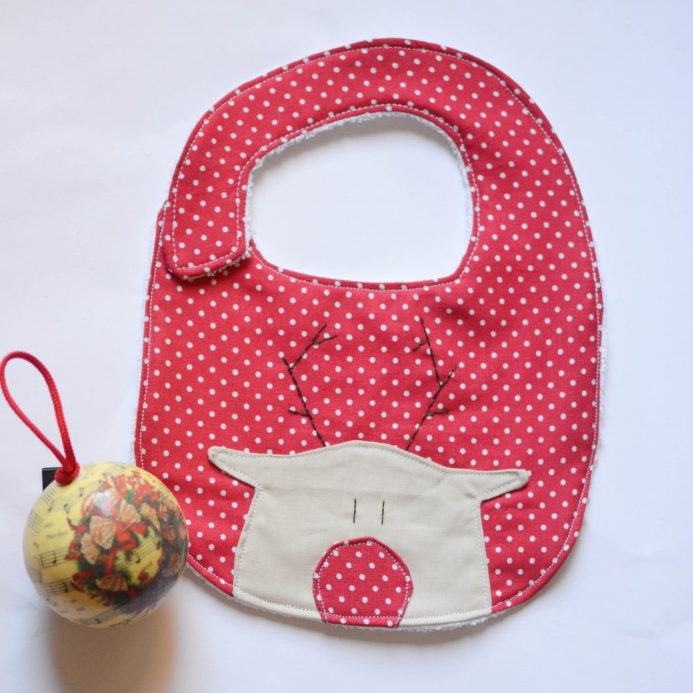 Bavaglino di Natale rosso a pois con renna Rudolph e chiusura in velcro