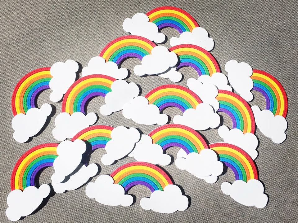 Calamita nuvole e arcobaleno 