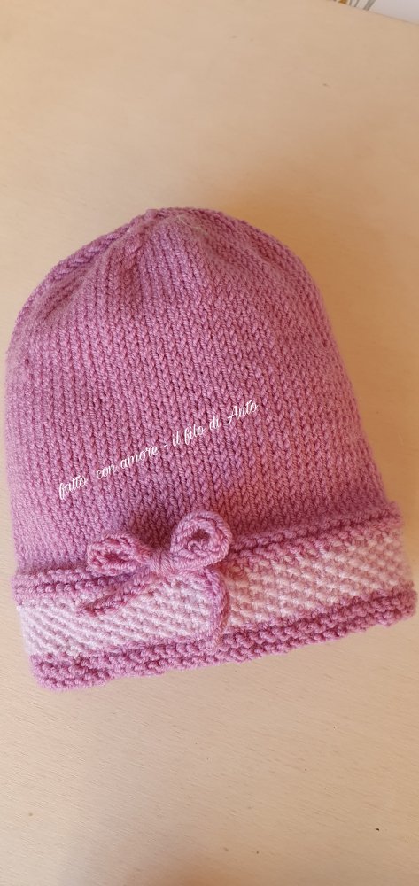 Cappello bambina con fiocco in lana merinos 100%