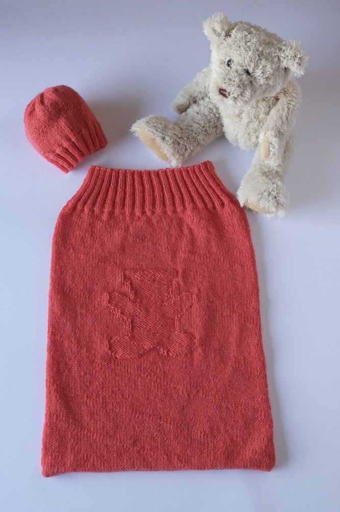 Sacco per la nanna dei neonati fatto a maglia con lana arancione
